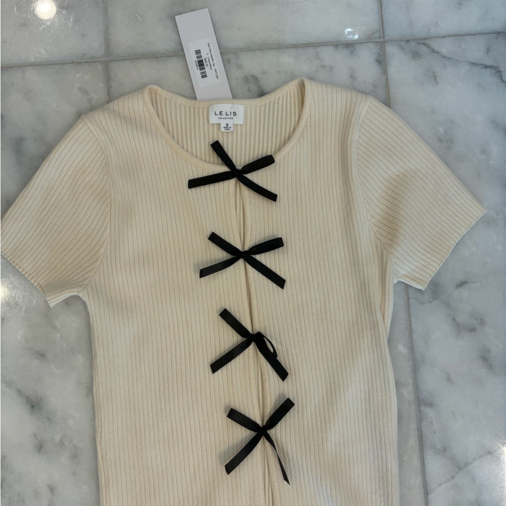 Le Lis Cream Ribbed Top with Black Bows